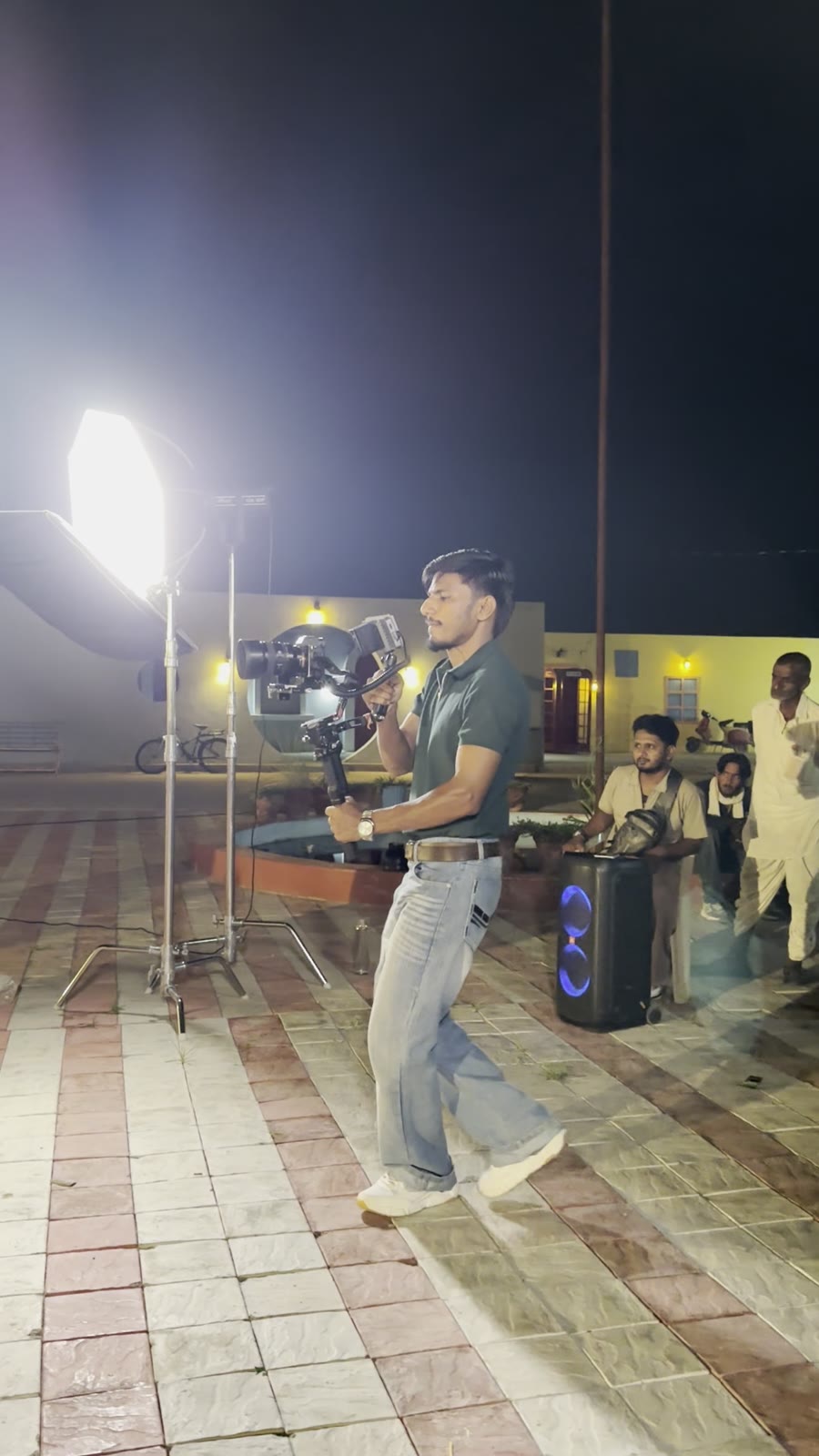 Gimbal shot under night lights on a music video set